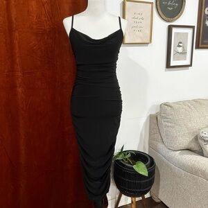 Black Bodycon Style Dress with Gathering on the sides & Cowl Neckline.